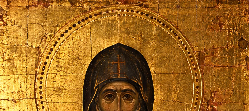 The burnished gold halo with a border of hand-punched dots